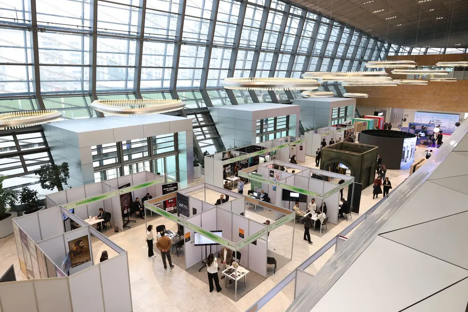Modern trade fair hall with exhibition stands from above