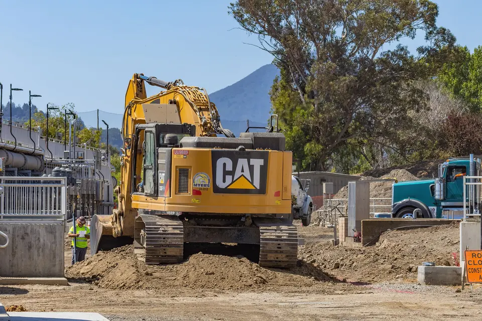 Excavator working on an active construction site